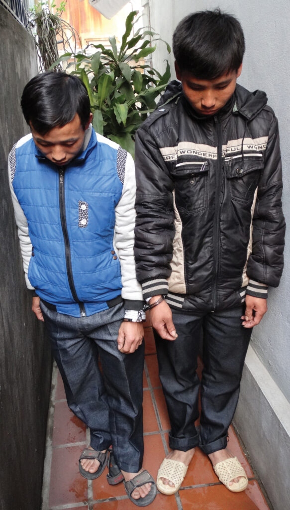 the two men handcuffed together