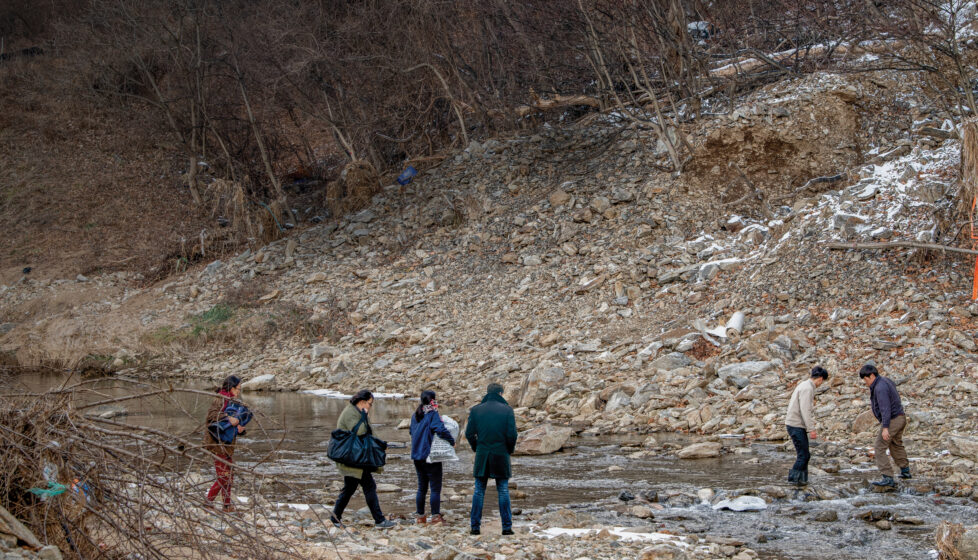 North Koreans Crossing Border